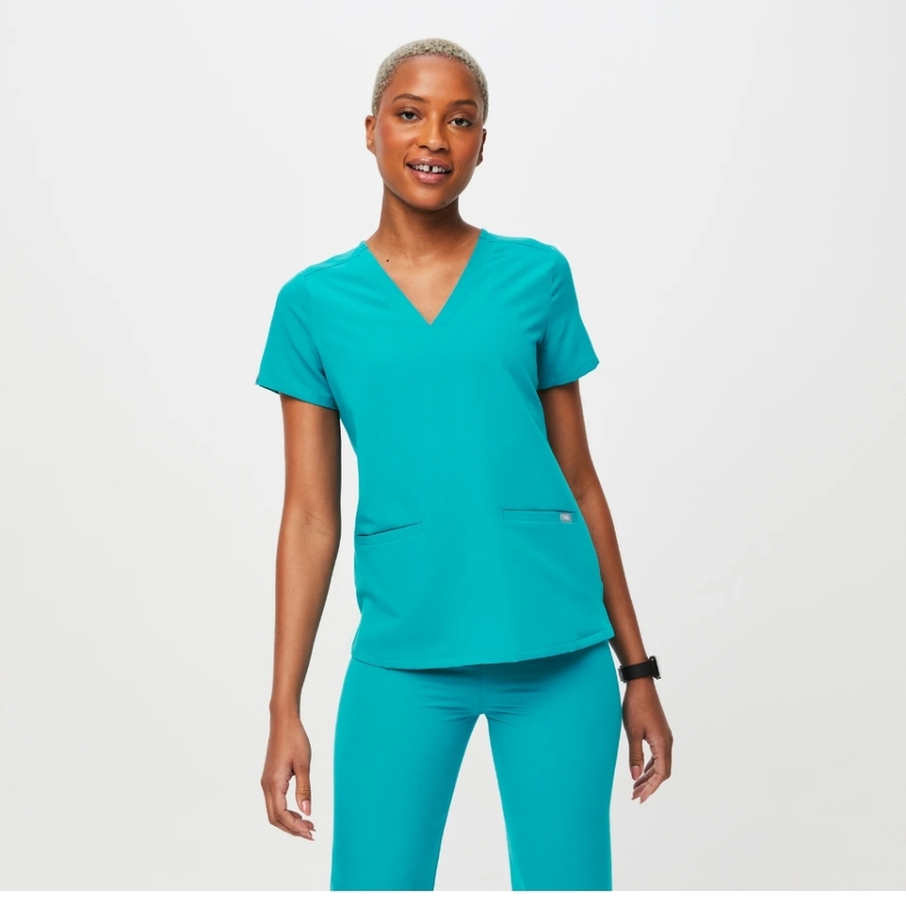 Figs set teal Casma three pocket scrub top and Yola skinny scrub pants